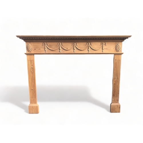 A CARVED PINE FIRE SURROUND More 3c952a