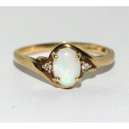 A 9ct gold ladies Opal and Diamond 3c95c0