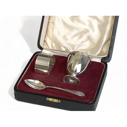 A Boxed silver christening set comprising