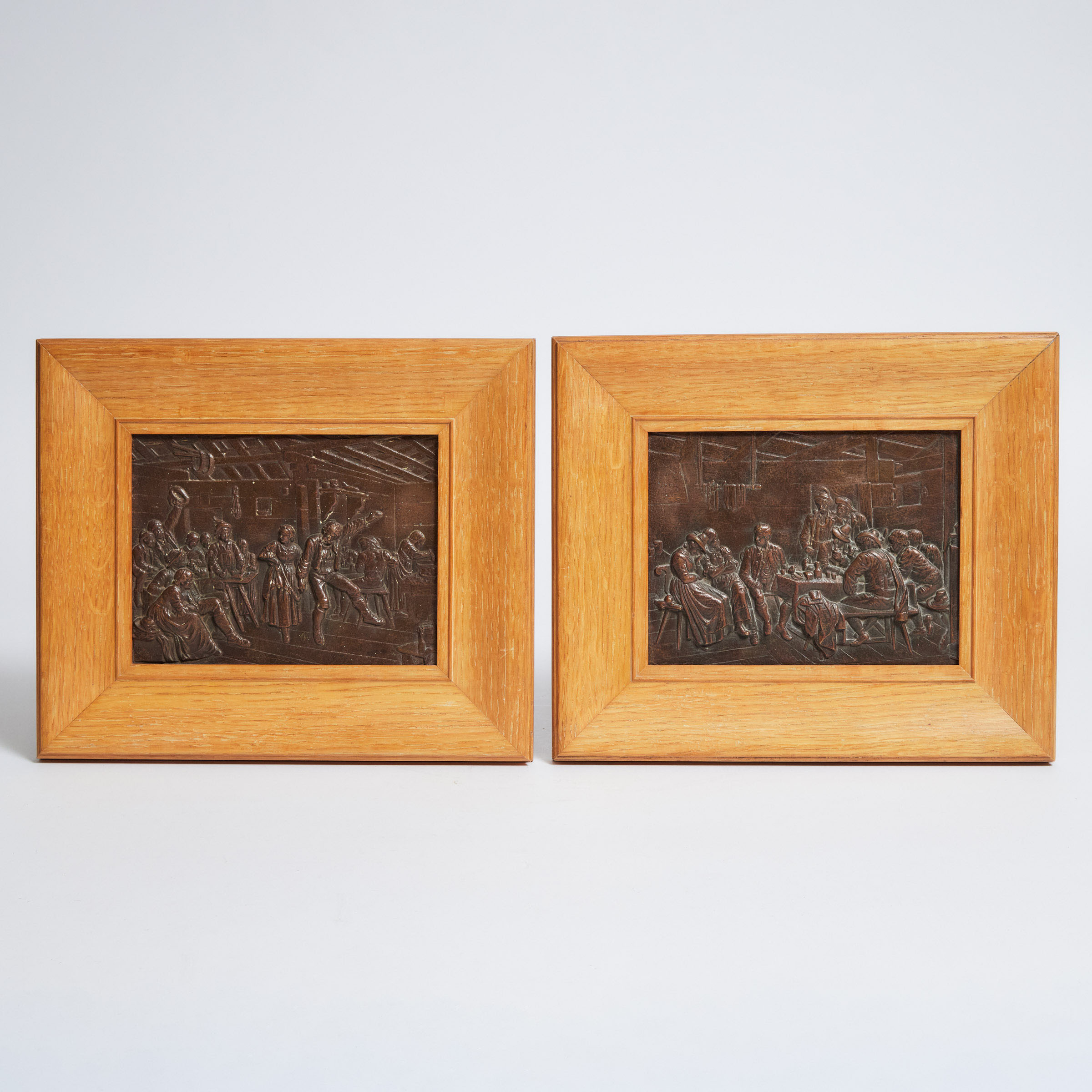 Pair of Bronze Relief Plaques Depicting