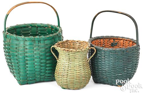 THREE SMALL GREEN PAINTED BASKETSThree 3c9c29