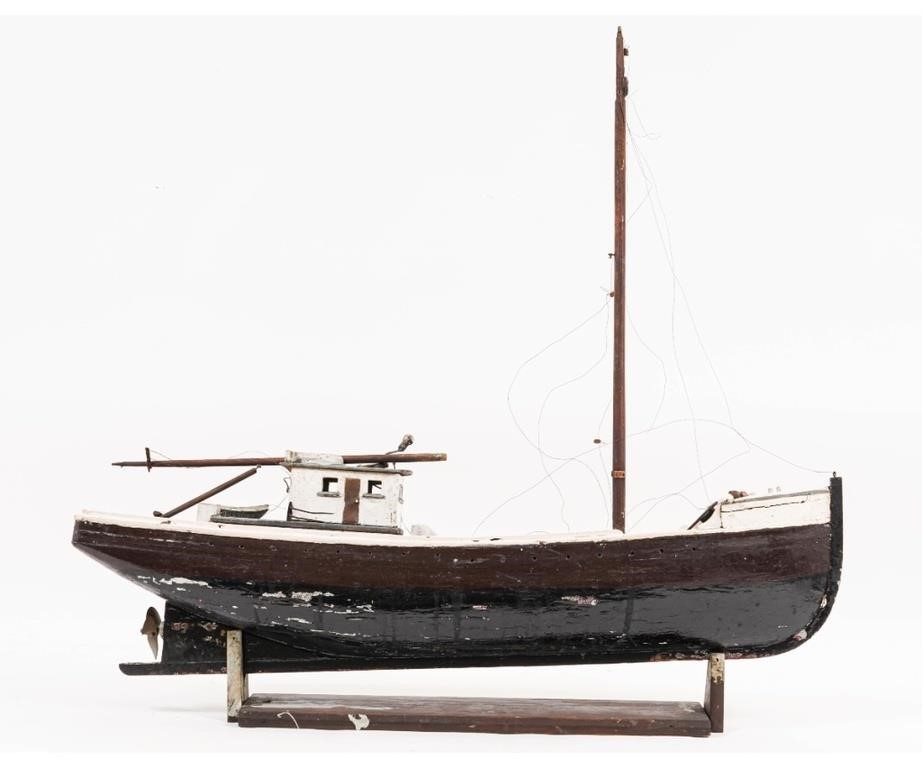 Primitive wood carved trawler ship