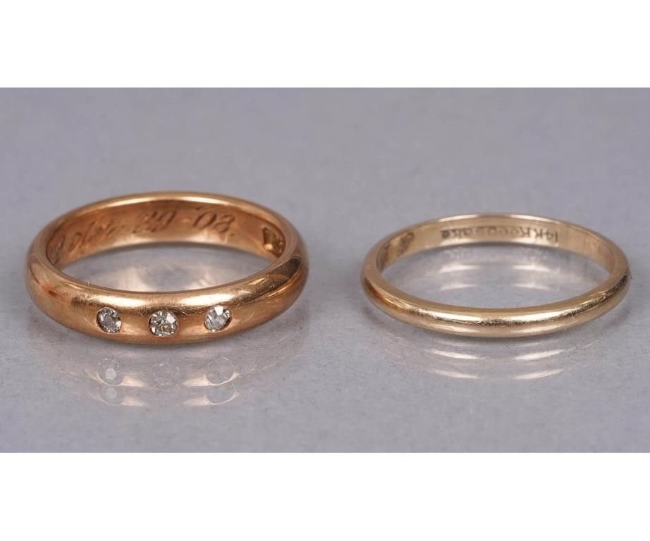 Two wedding bands to include a 14k yellow