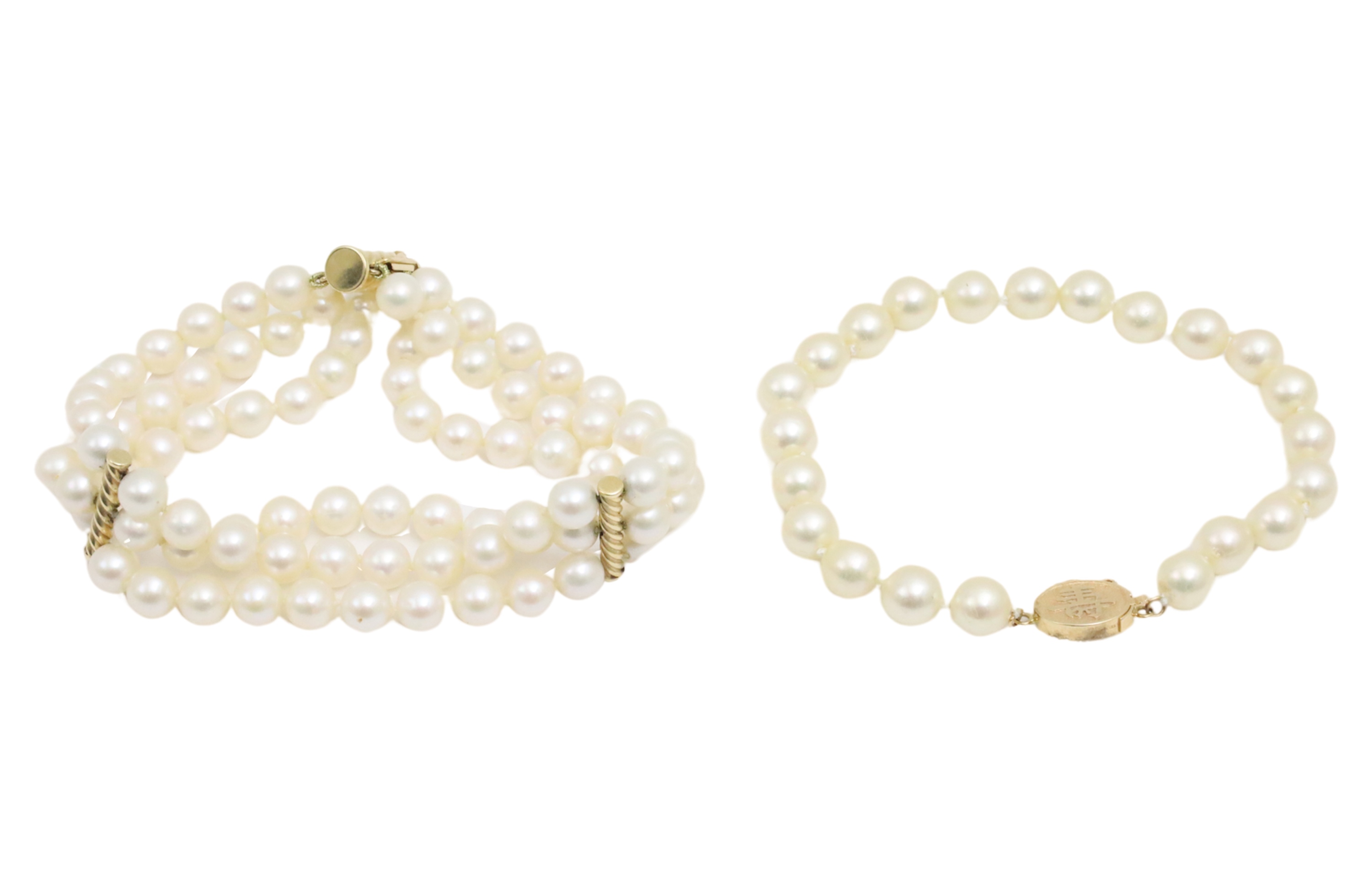 TWO 8" PEARL BRACELETS Two 8 inch