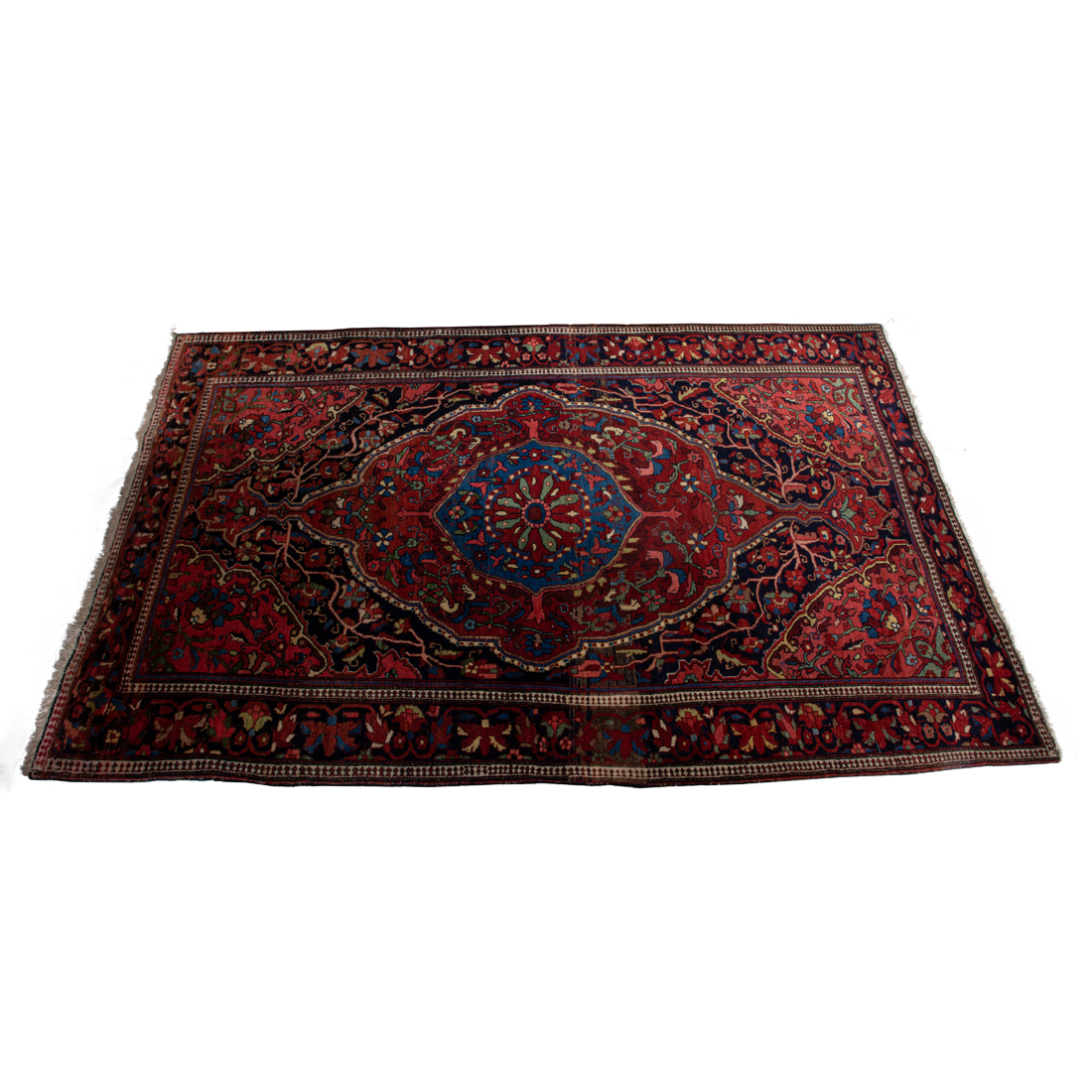 AN ANTIQUE PERSIAN CARPET An antique