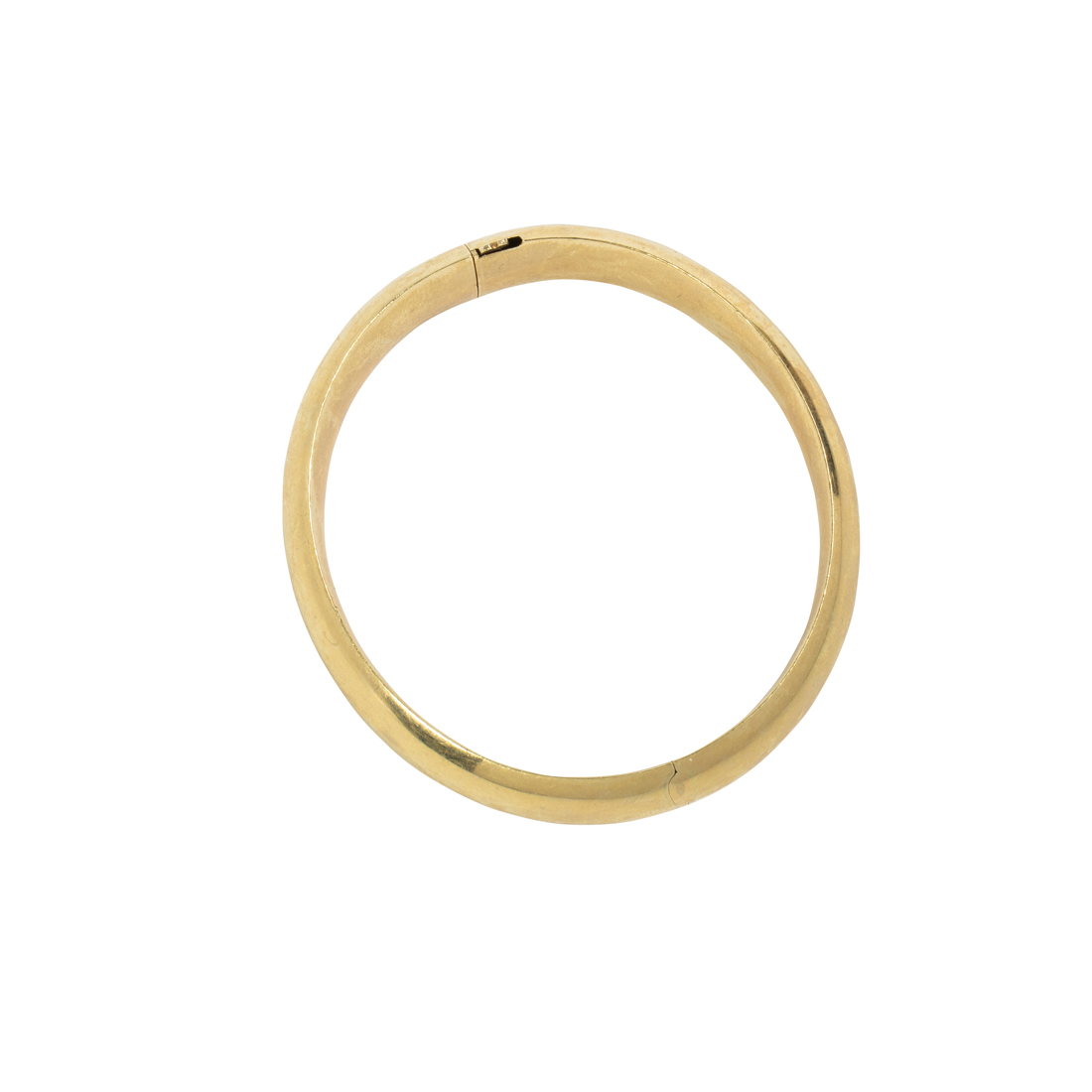 A 14K GOLD BANGLE A 14k gold bangle
with