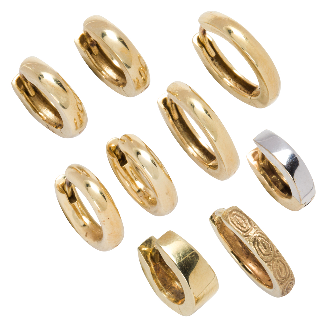 A GROUP OF SMALL GOLD HUGGIE EARRINGS