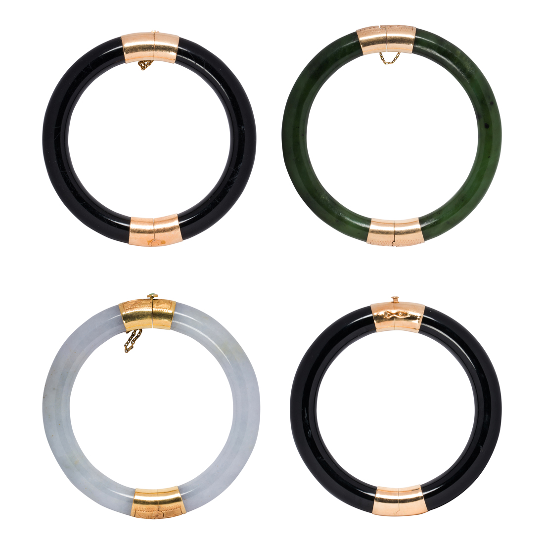 A SET OF FOUR JADE AND 14K GOLD 3cdbbc