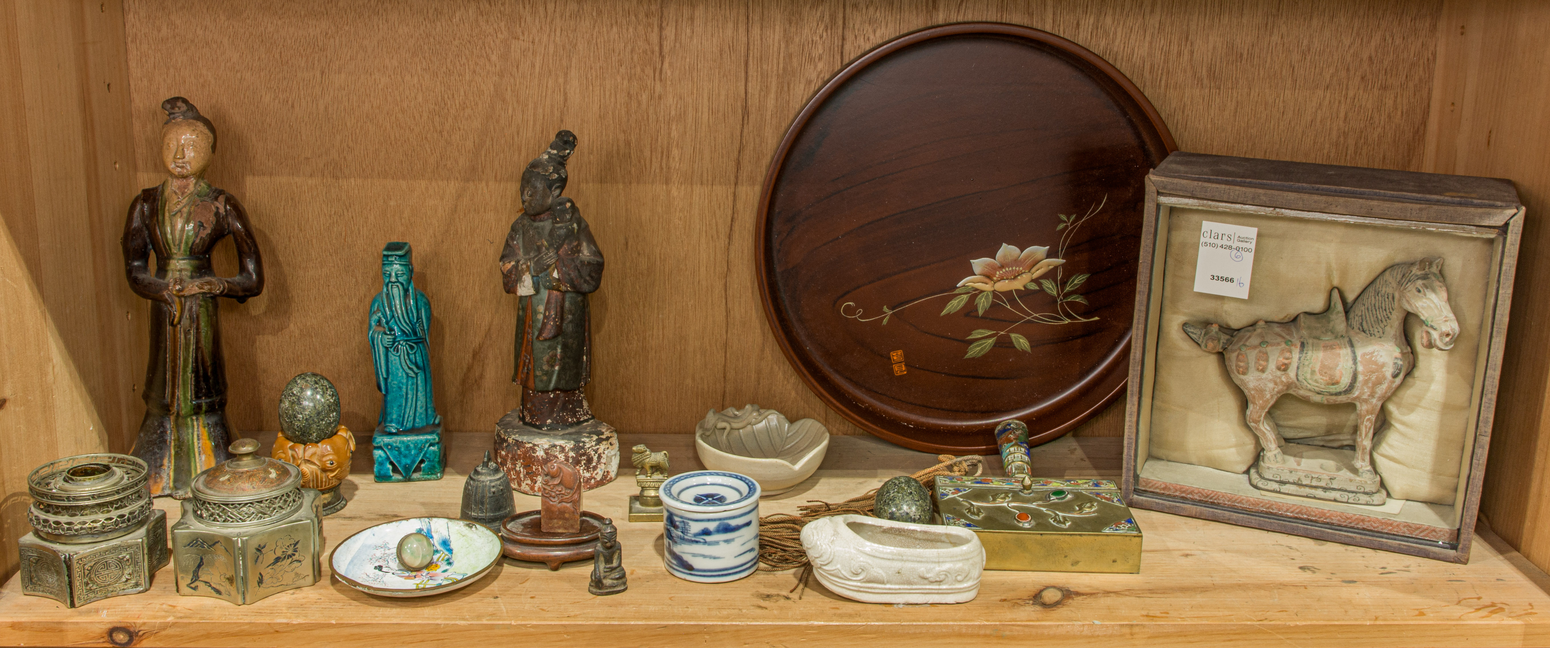 SHELF OF ASIAN DECORATIONS Shelf