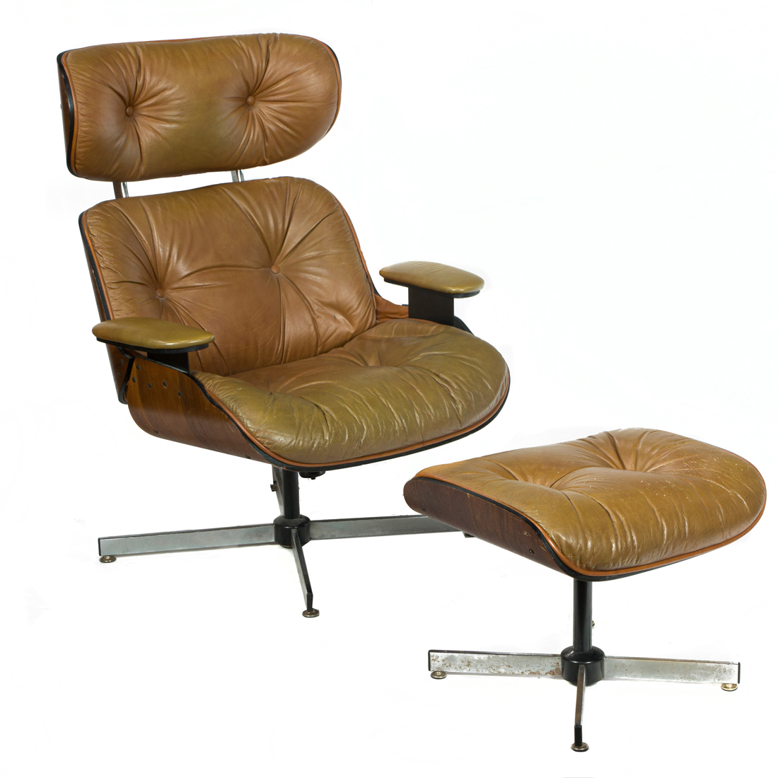 A PLYCRAFT EAMES STYLE TAN UPHOLSTERED