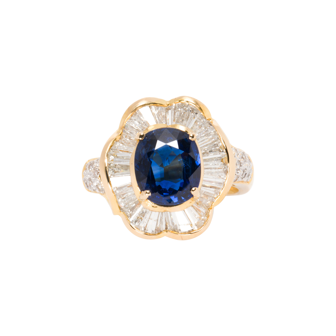 A SAPPHIRE, DIAMOND AND 18K GOLD RING