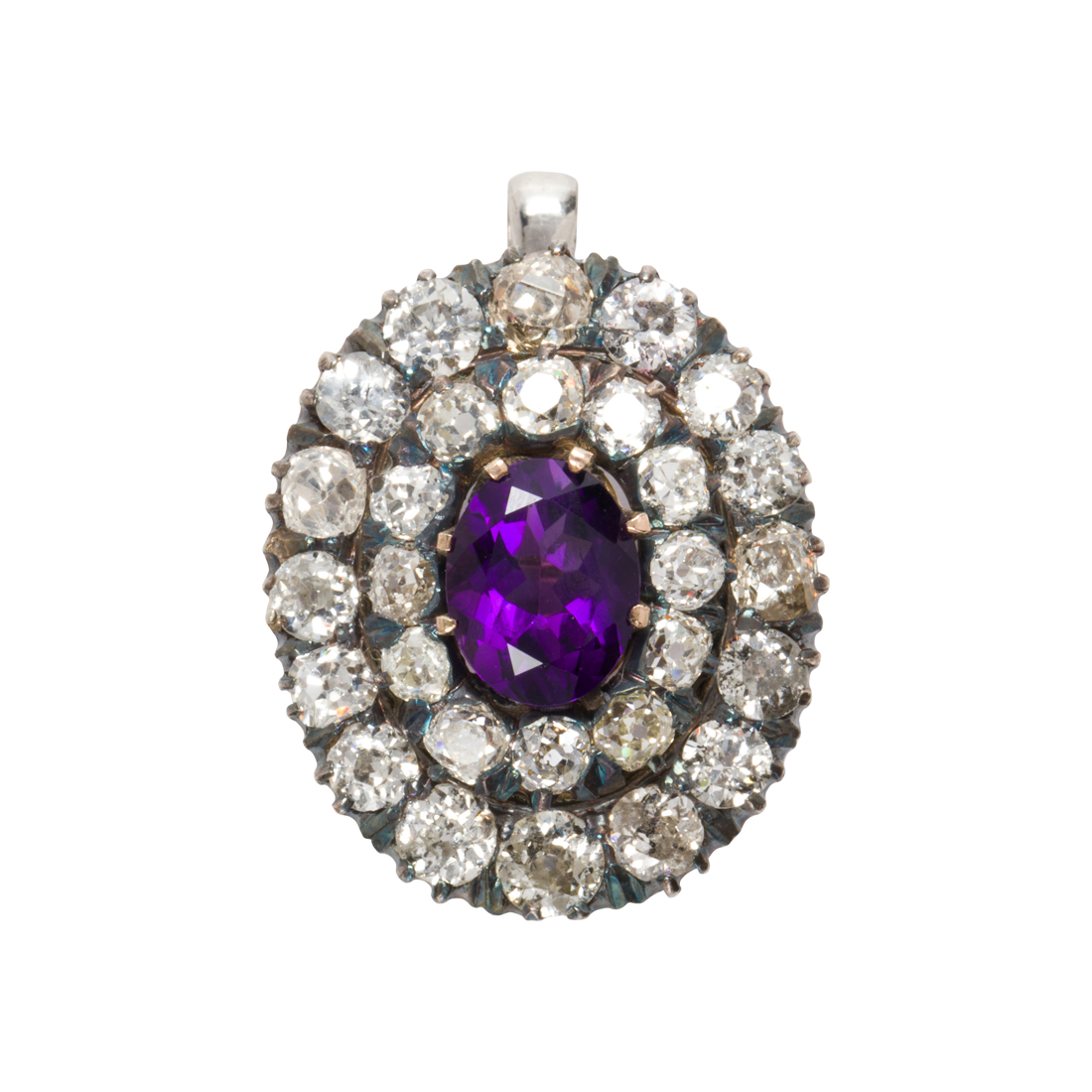 AN AMETHYST, DIAMOND AND SILVER-TOPPED