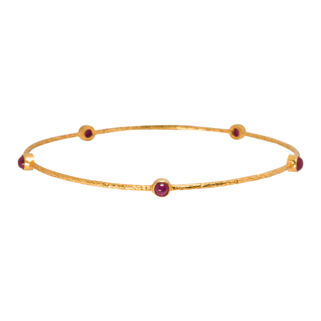 A RUBY AND 18K GOLD BANGLE BRACELET