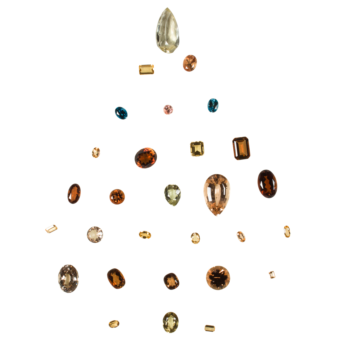 A GROUP OF UNMOUNTED TOPAZ A group