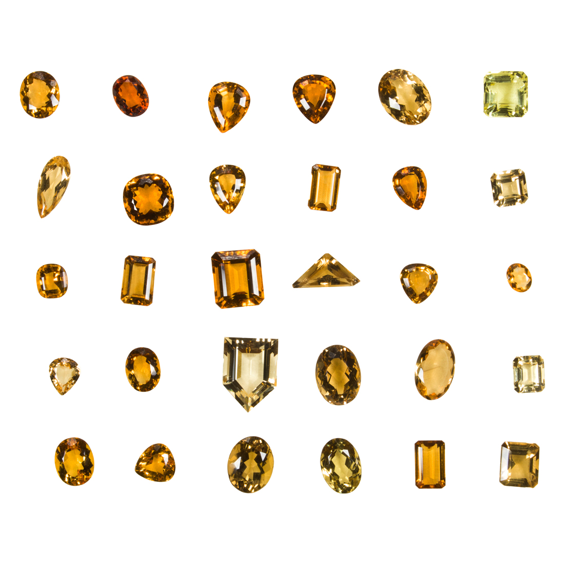 A GROUP OF UNMOUNTED CITRINES A