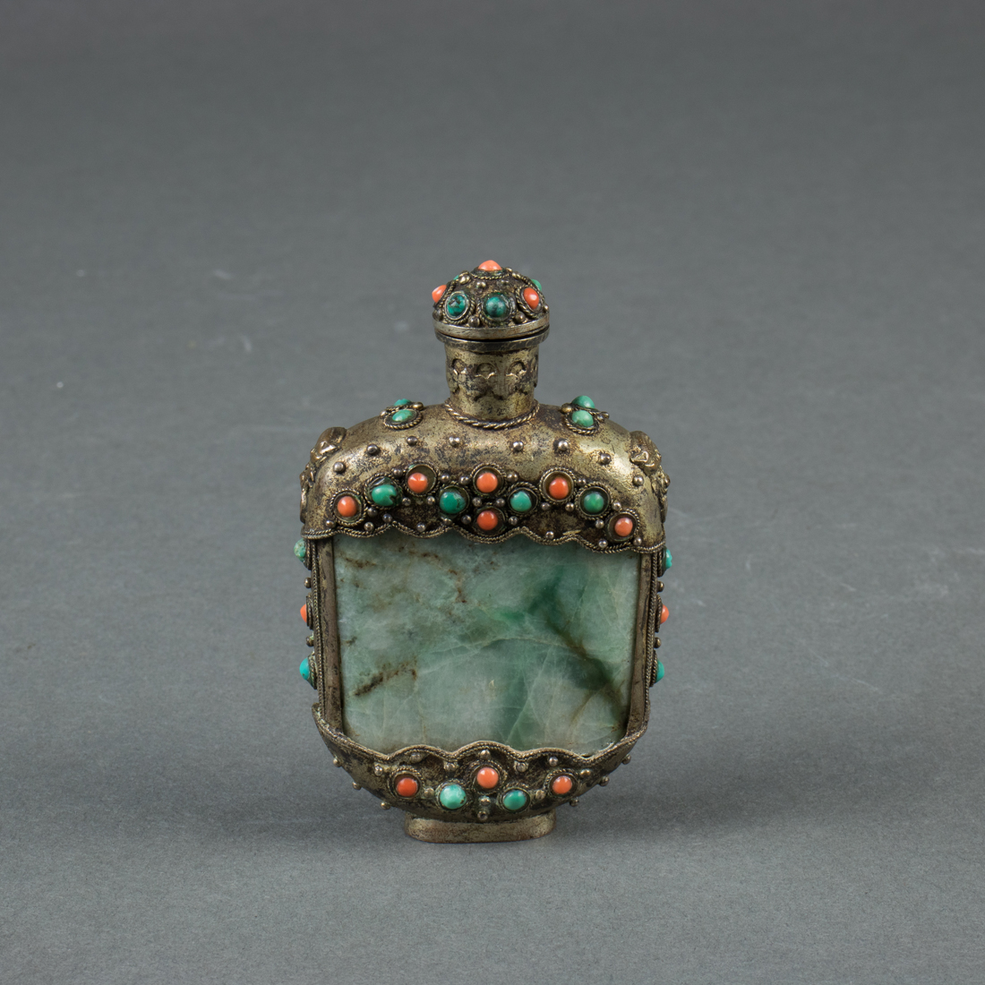 MONGOLIAN MIXED-METAL MOUNTED JADEITE