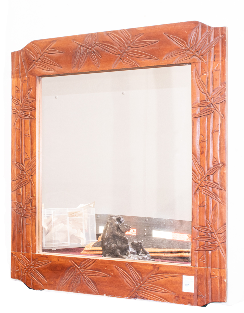 A JAPANESE MIRROR CARVED WITH BAMBOO