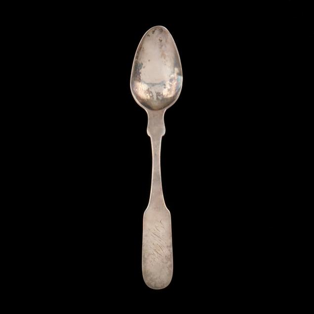 A NORTH CAROLINA COIN SILVER TEASPOON,