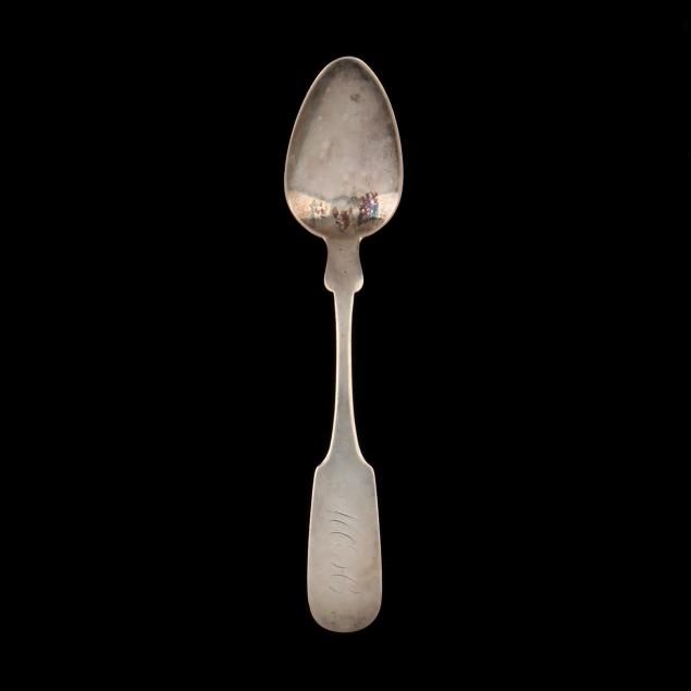 A NORTH CAROLINA COIN SILVER TEASPOON,