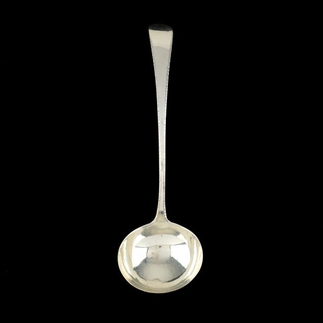 A GEORGE III SILVER PUNCH LADLE,