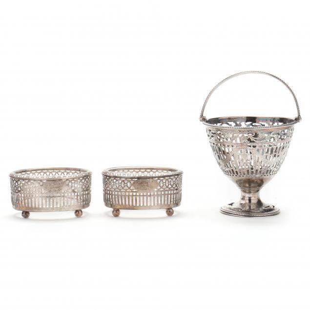 A GEORGE III SILVER SUGAR BASKET AND