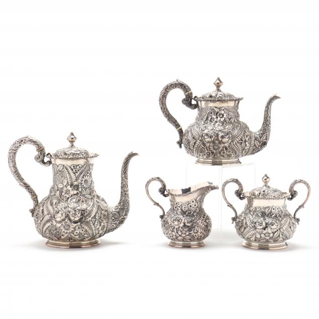 A STERLING SILVER REPOUSSE TEA