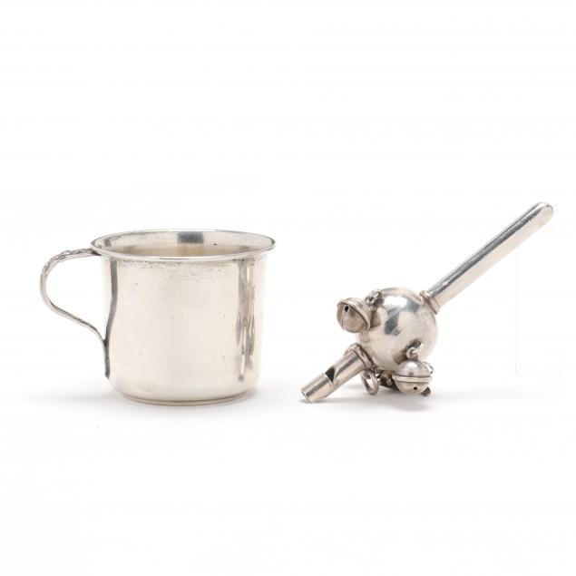 A STERLING SILVER BABY CUP AND RATTLE