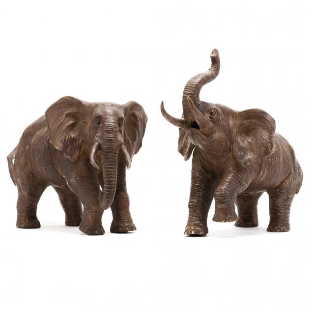 A PAIR OF ASIAN CERAMIC ELEPHANTS