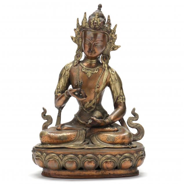 A SOUTHEAST ASIAN BRONZE BHUDDIST FIGURE