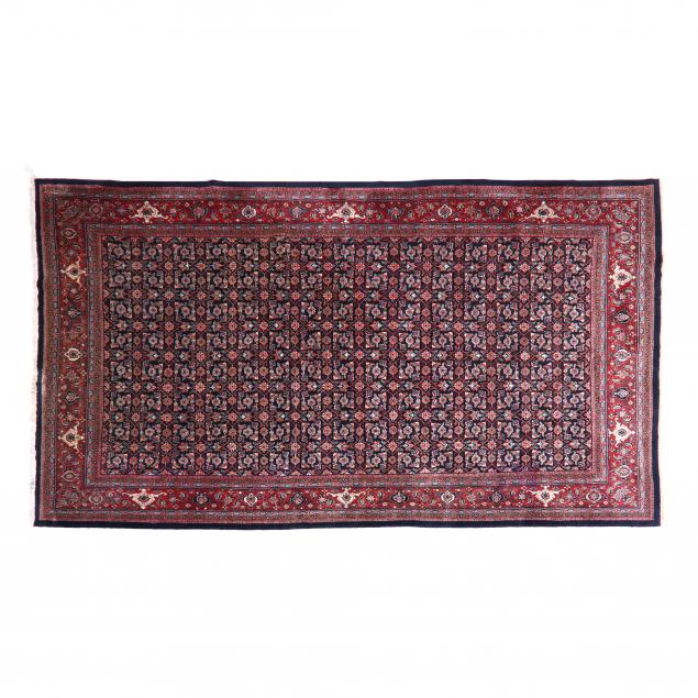 INDO PERSIAN CARPET The navy field with