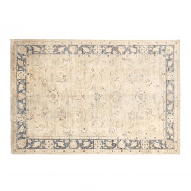 PAK OUSHAK AREA RUG The beige field