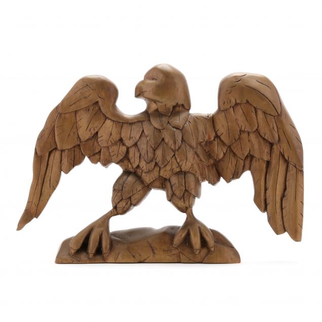 A FOLK ART CARVED GILTWOOD EAGLE 3cc5c9