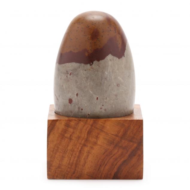 A SHIVA LINGAM STONE WITH CARVED 3cc5d2