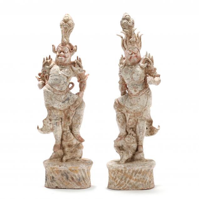 A LARGE PAIR OF CHINESE LOKAPALA GUARDIAN