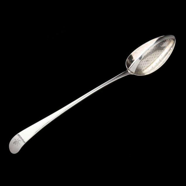 A GEORGE III SILVER STRAINER SPOON