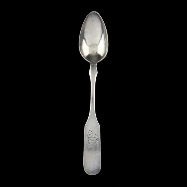 A NORTH CAROLINA COIN SILVER TEASPOON,