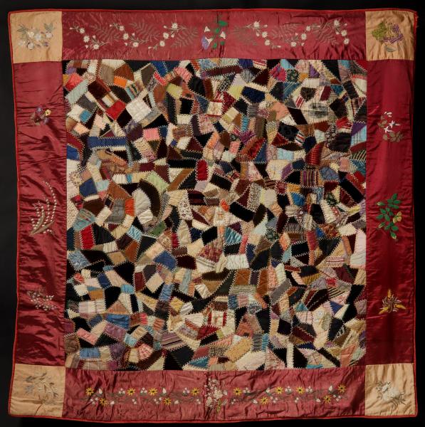 AN UNUSUAL CRAZY QUILT WITH EMBROIDERED 3cc874