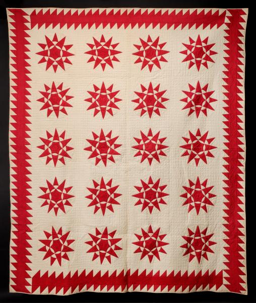 A MARINER'S COMPASS PATTERN QUILT