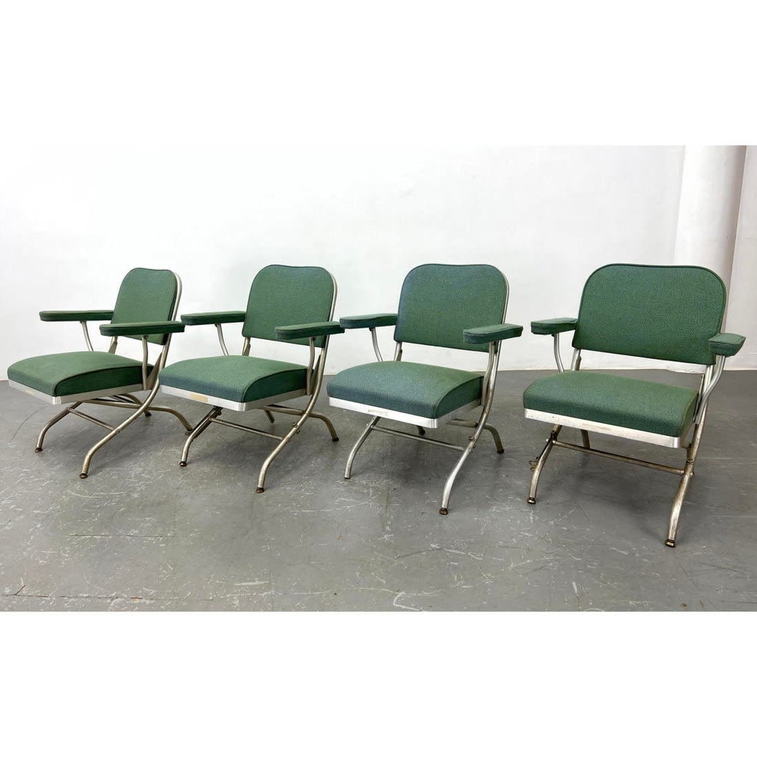 Set 4 Warren McArthur Folding Armchairs.