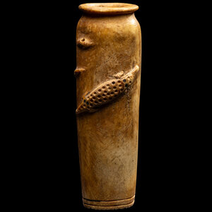 An Egyptian Bone Vase with Crocodiles