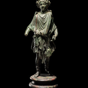 A Roman Bronze Lar with Copper