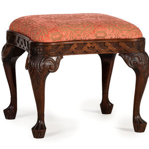 A George III Style Carved Mahogany