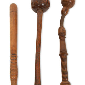 Three Carved Wood Clubs 19th Century comprising 3d037a