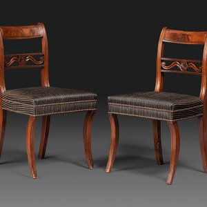 A Pair of Classical Carved and