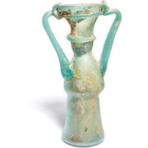 A Roman Green Glass Vessel
Circa