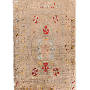 A Khotan Wool Rug
Circa 1910
5