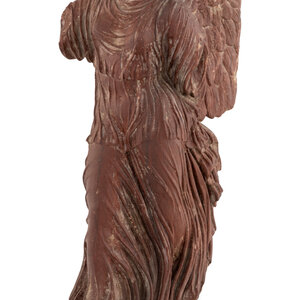 A Carved Red Marble Figure of the