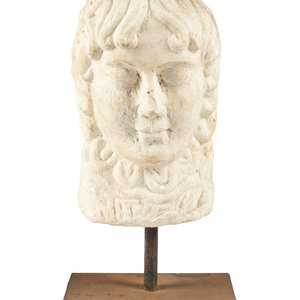 A Continental Marble Portrait Head
raised