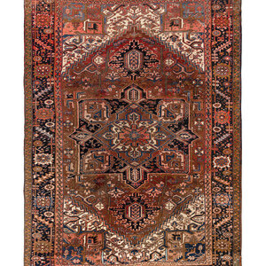 A Heriz Wool Rug
Circa 1940
11