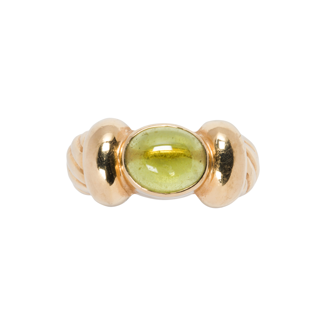 A PERIDOT AND 14K GOLD RING A peridot